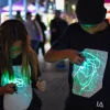 Fashion & Style|Magic, Spooky & Spells-Illuminated Apparel Interactive Glow T-Shirt - Black age 7-8