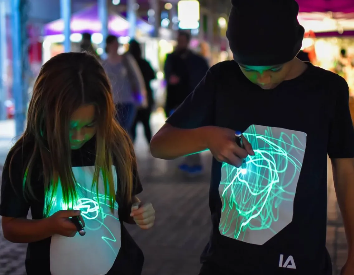 Fashion & Style|Magic, Spooky & Spells-Illuminated Apparel Interactive Glow T-Shirt - Black age 9-11